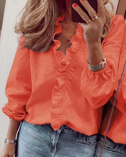 Blusa da donna a maniche lunghe con volant
