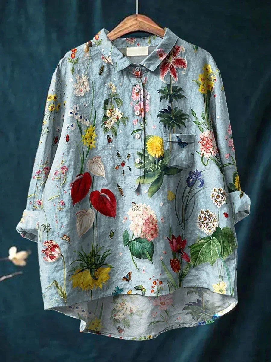 Camicetta da donna a fiori con abbottonatura