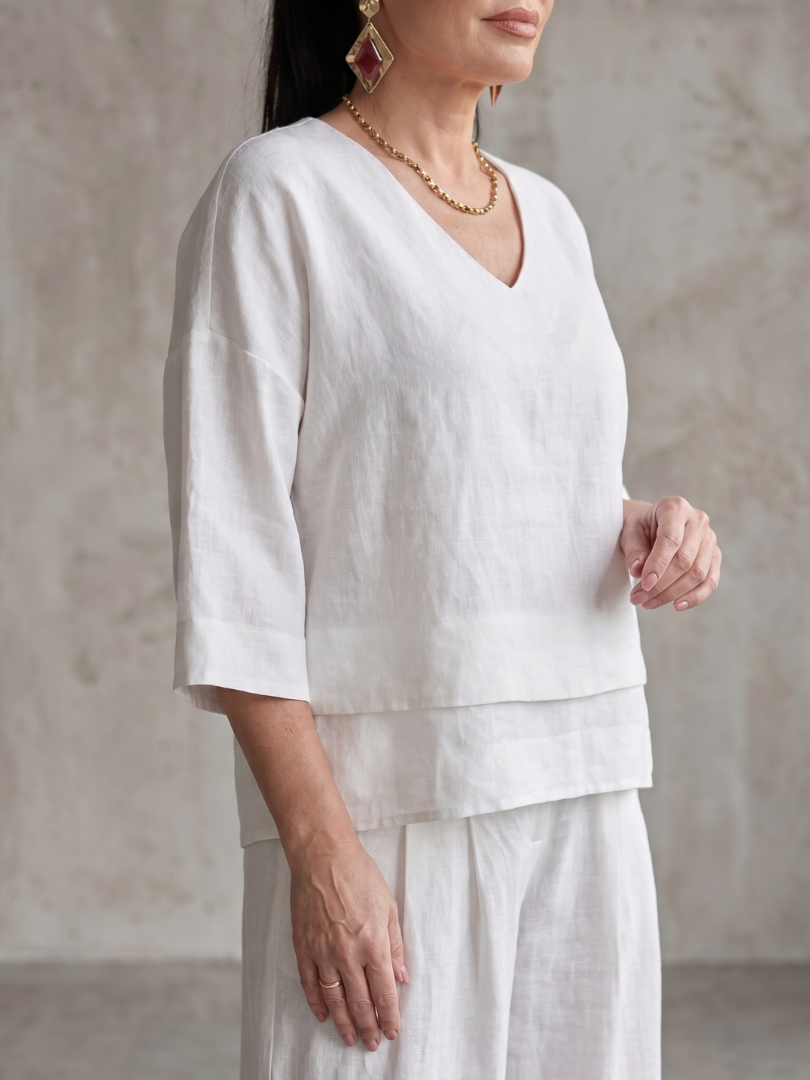 Completo da donna a strati con pantaloni a gamba larga