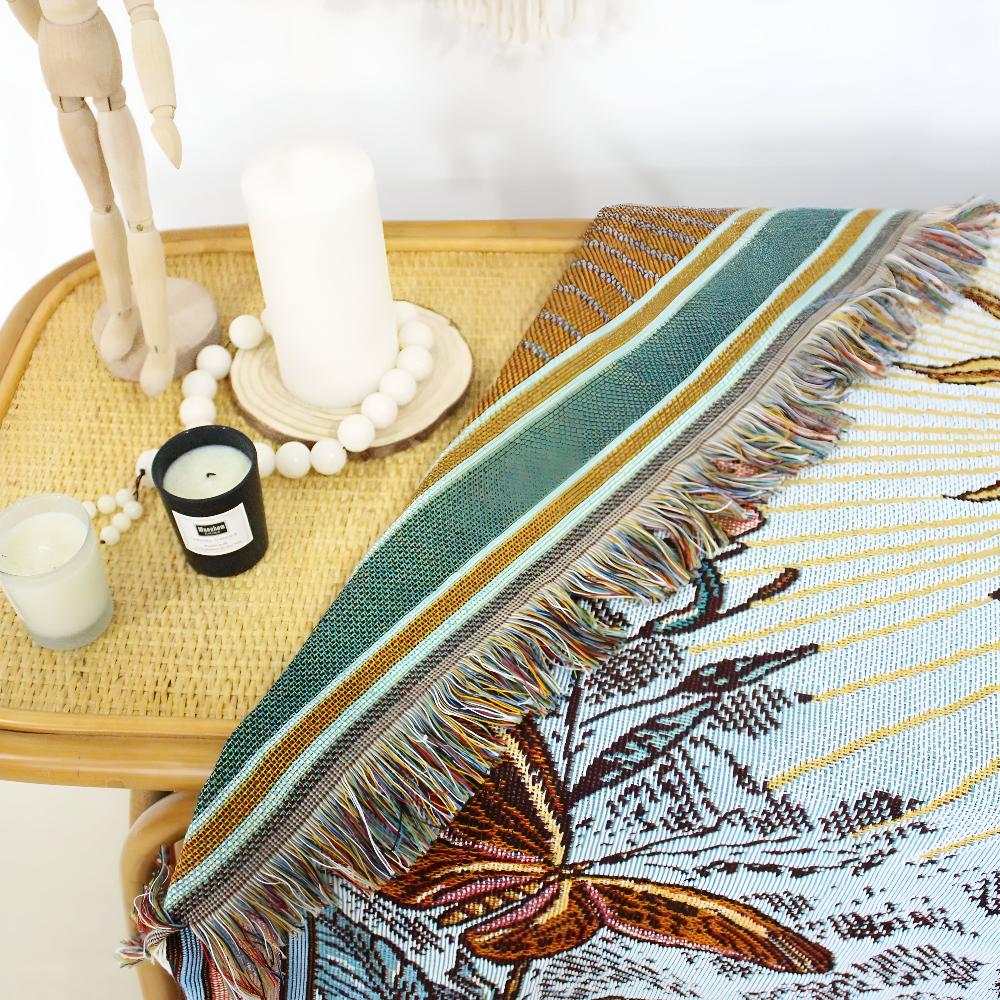 Coperta arazzo in stile boho con motivo a sole