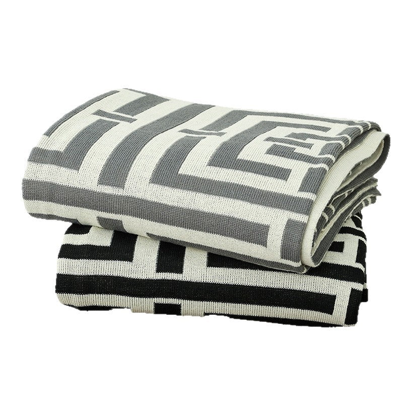 Coperta decorativa calda da donna con moderno motivo geometrico