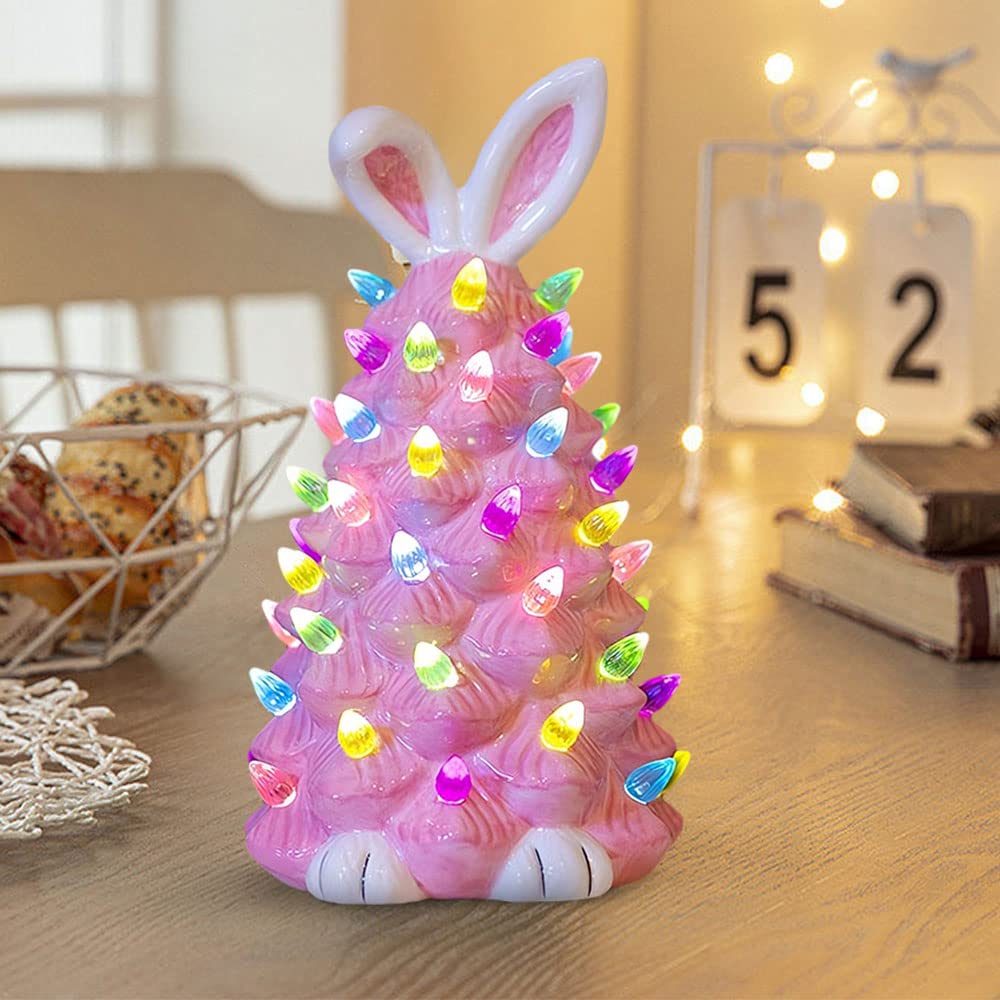 Albero di Natale rosa con orecchie da coniglio