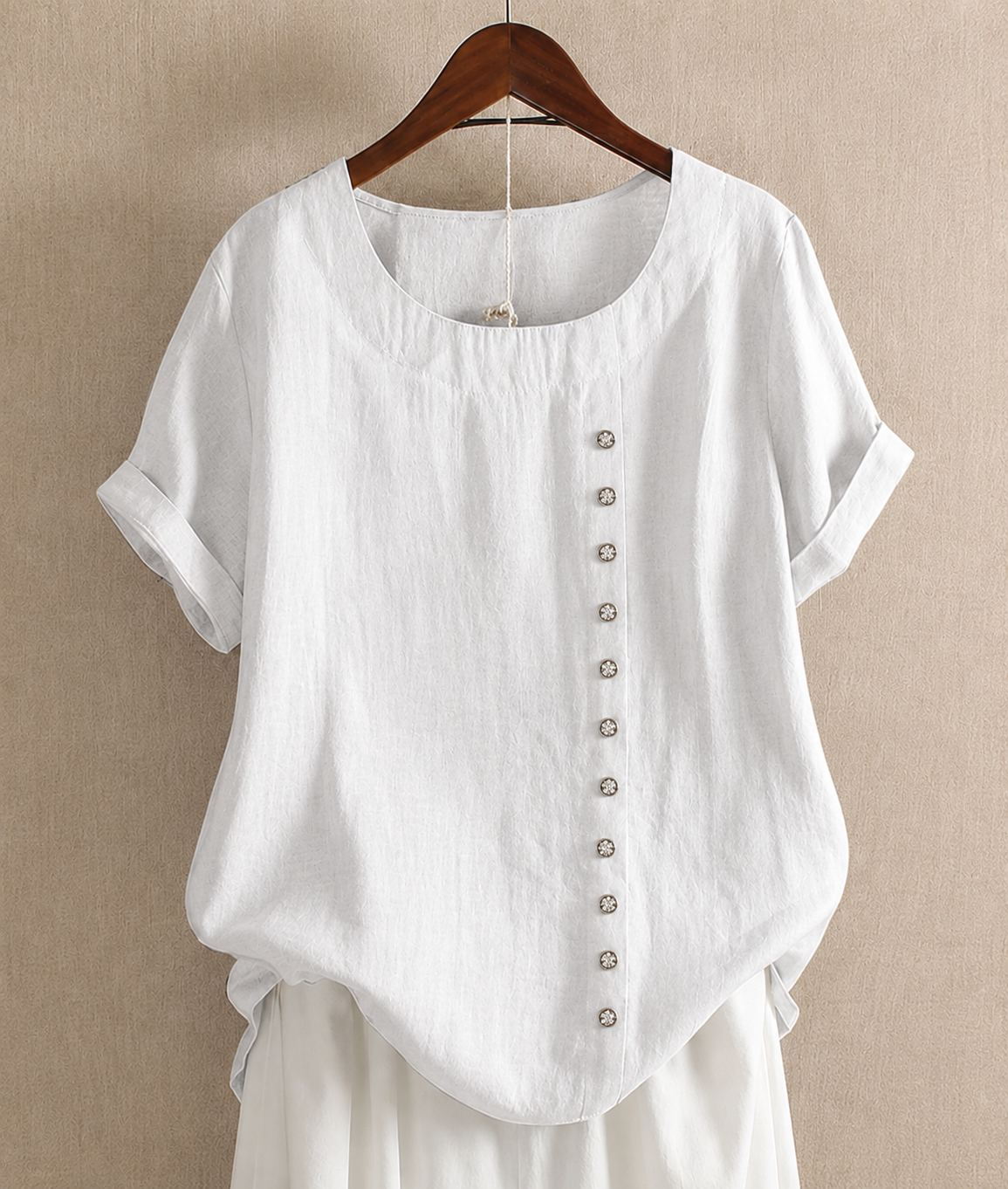 Blusa a tinta unita a maniche corte con scollo rotondo