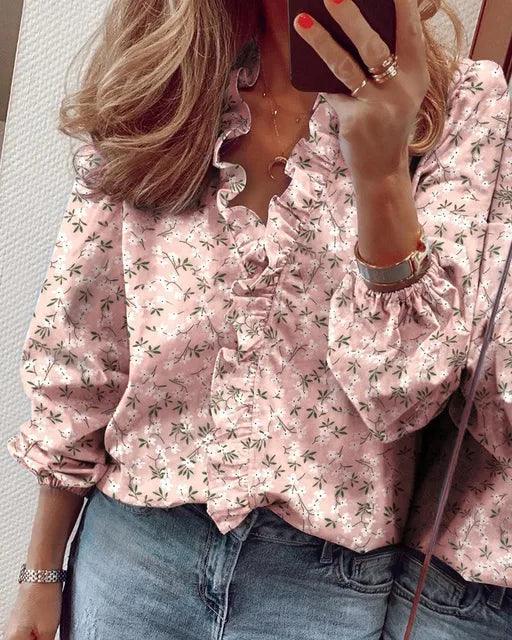 Blusa da donna a maniche lunghe con volant