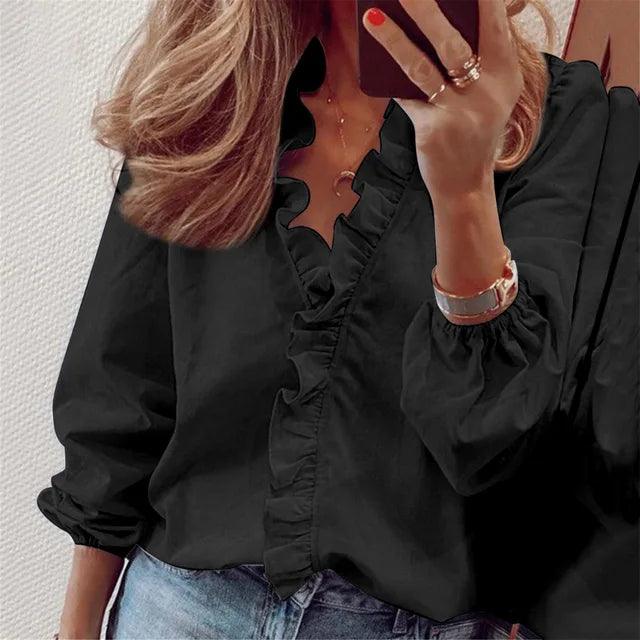 Blusa da donna a maniche lunghe con volant