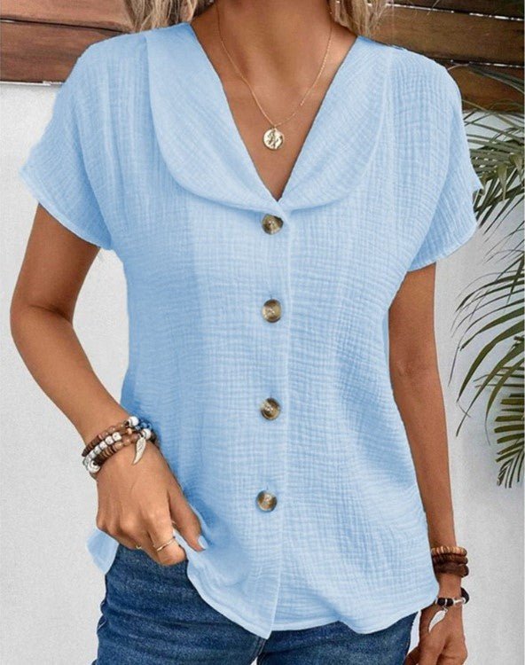 Blusa da donna strutturata con cannoncino dei bottoni