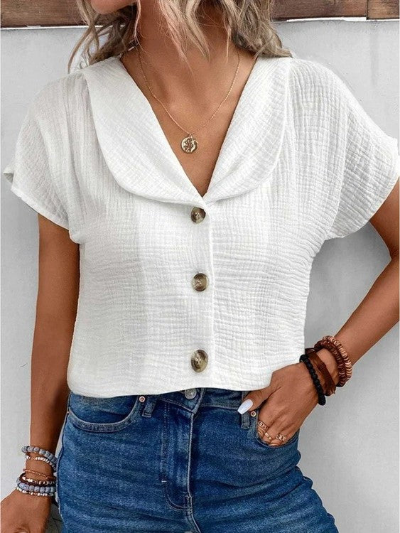 Blusa da donna strutturata con cannoncino dei bottoni