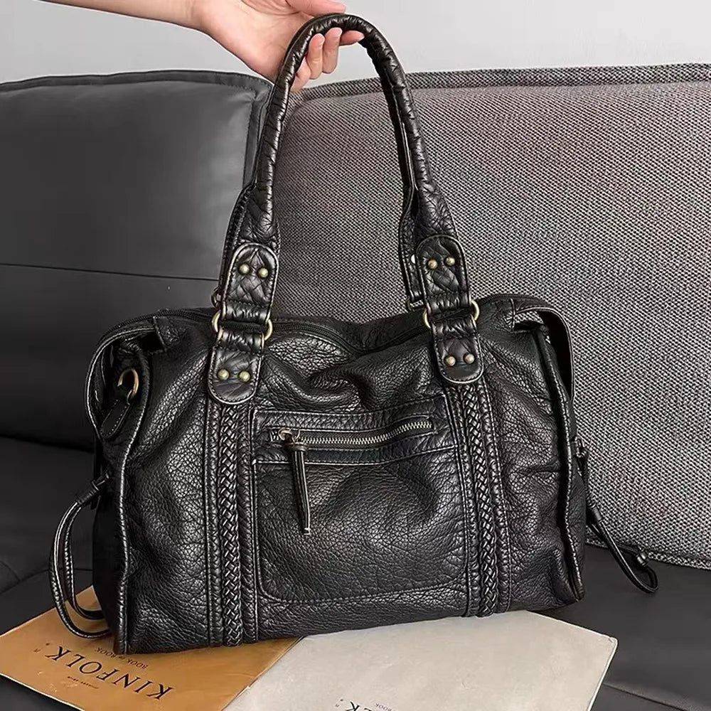 Borsa a mano nera per le lezioni