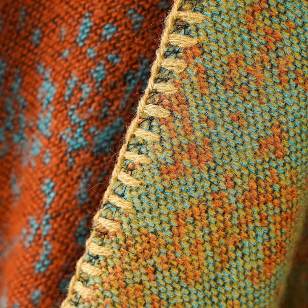 Calda sciarpa a coperta con motivo barocco