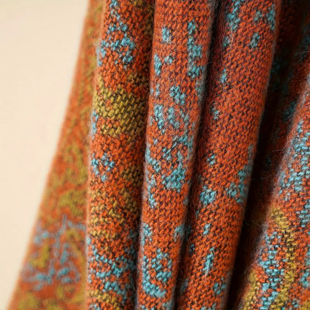 Calda sciarpa a coperta con motivo barocco