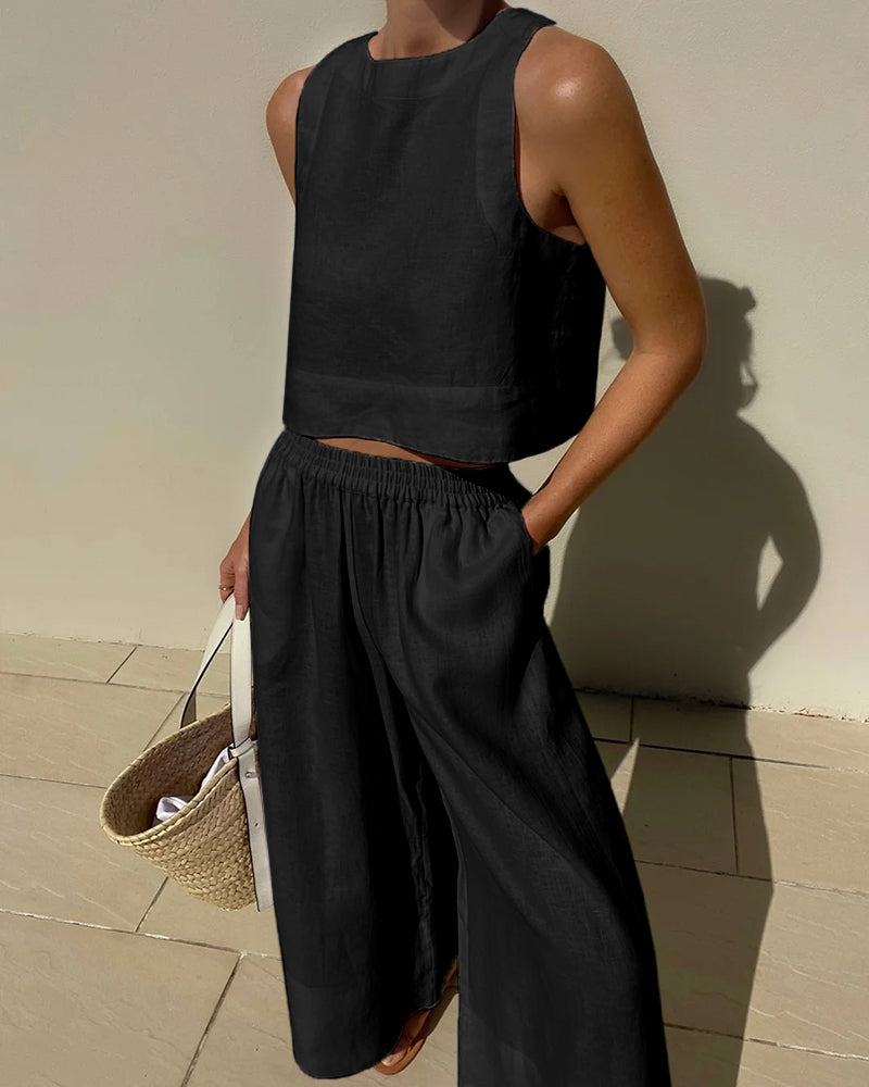 Completo da donna 2 pezzi: top corto senza maniche e pantaloni a gamba larga