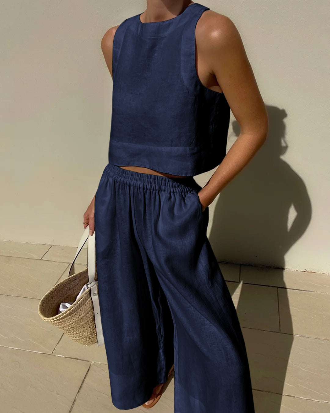 Completo da donna 2 pezzi: top corto senza maniche e pantaloni a gamba larga