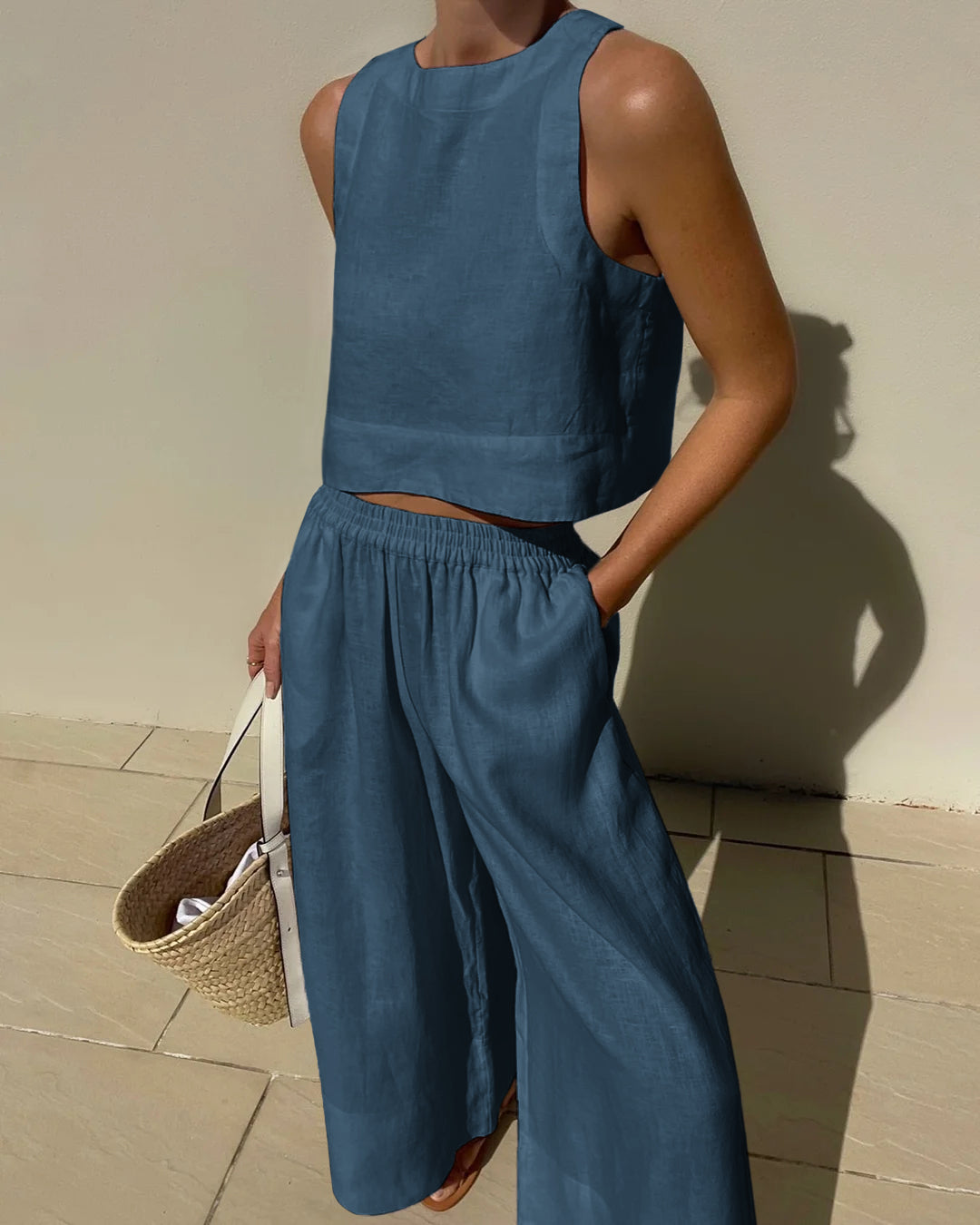 Completo da donna 2 pezzi: top corto senza maniche e pantaloni a gamba larga
