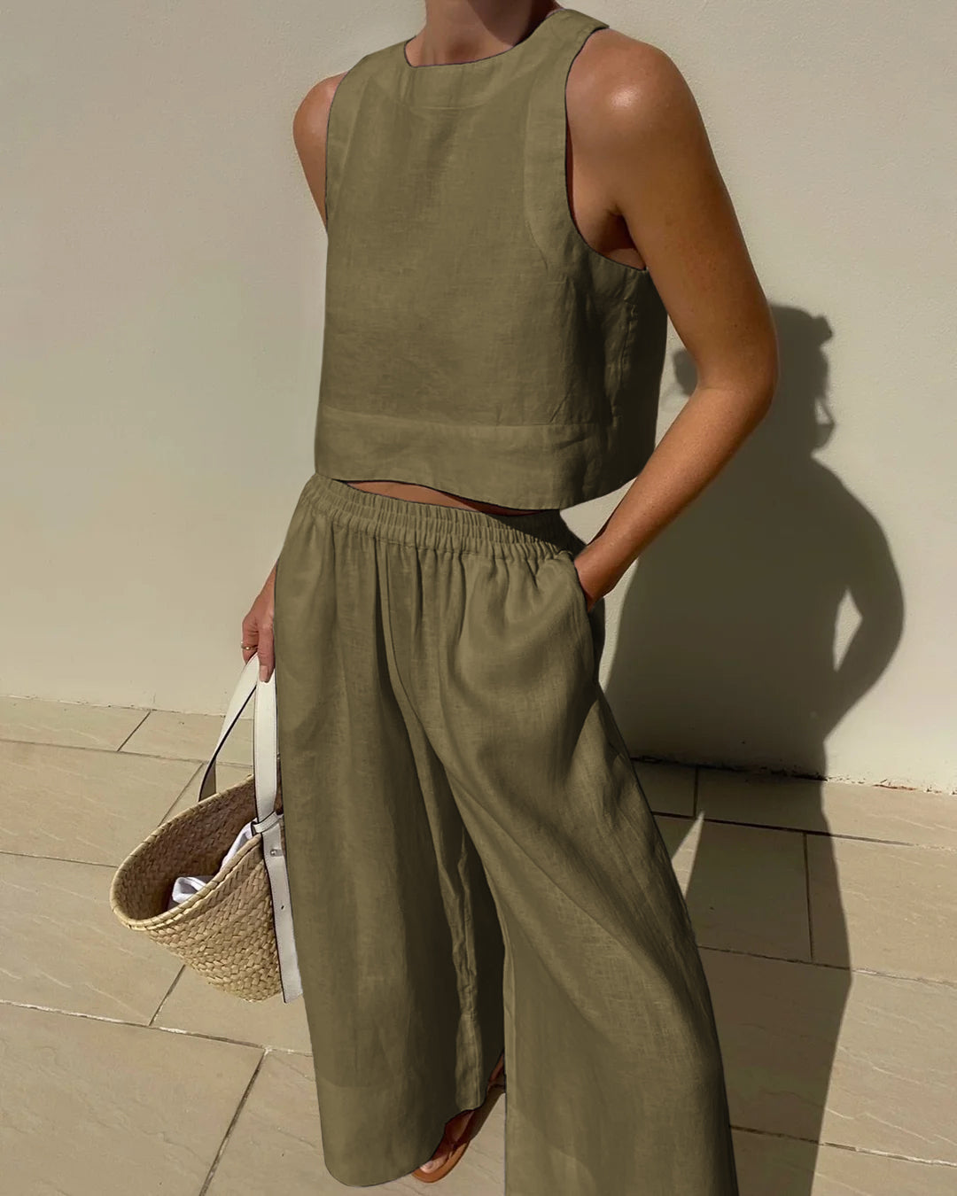 Completo da donna 2 pezzi: top corto senza maniche e pantaloni a gamba larga