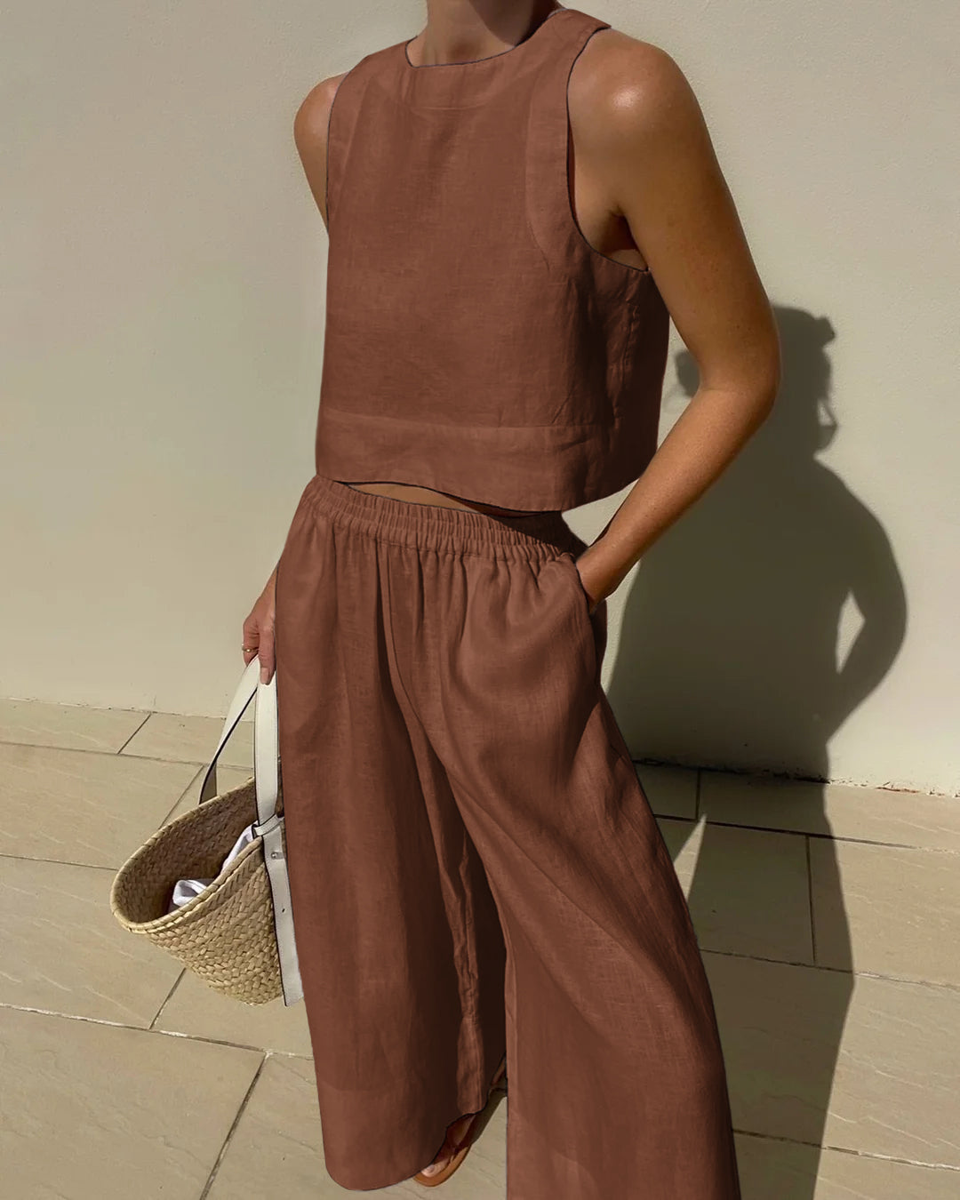 Completo da donna 2 pezzi: top corto senza maniche e pantaloni a gamba larga