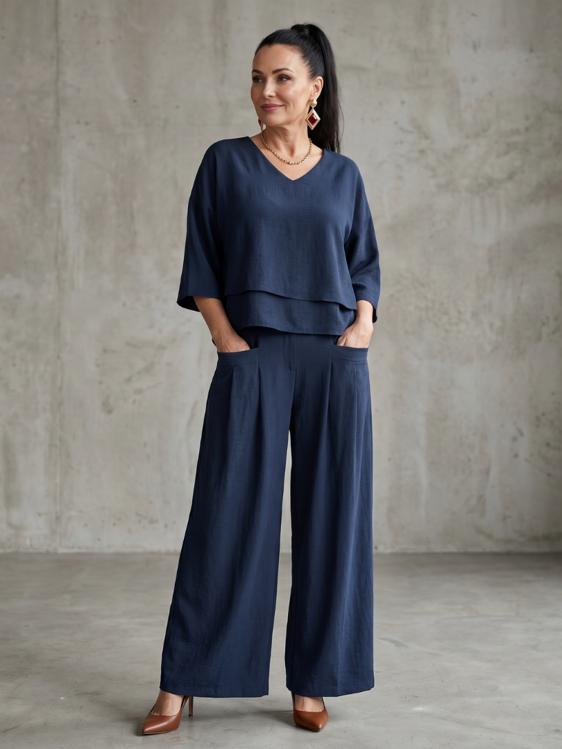 Completo da donna a strati con pantaloni a gamba larga