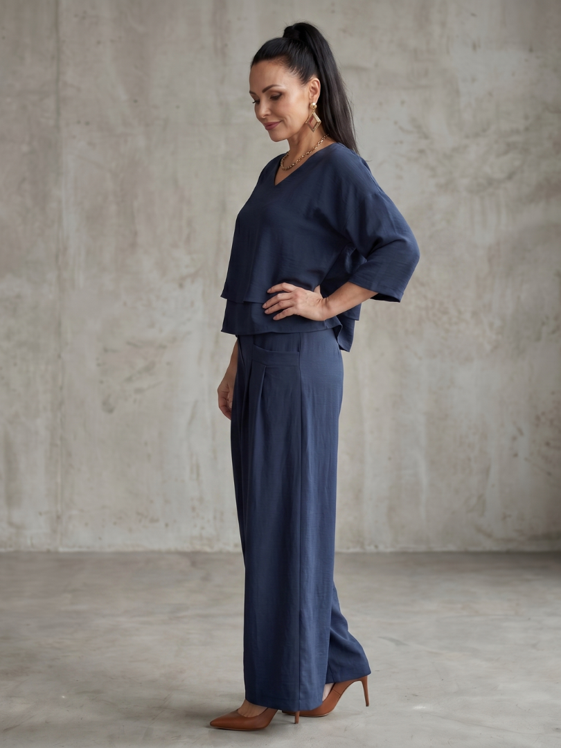 Completo da donna a strati con pantaloni a gamba larga