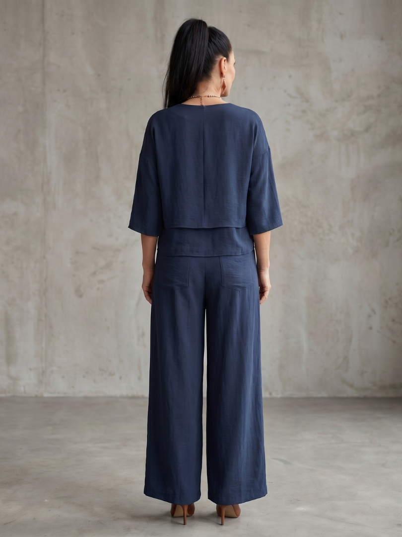 Completo da donna a strati con pantaloni a gamba larga