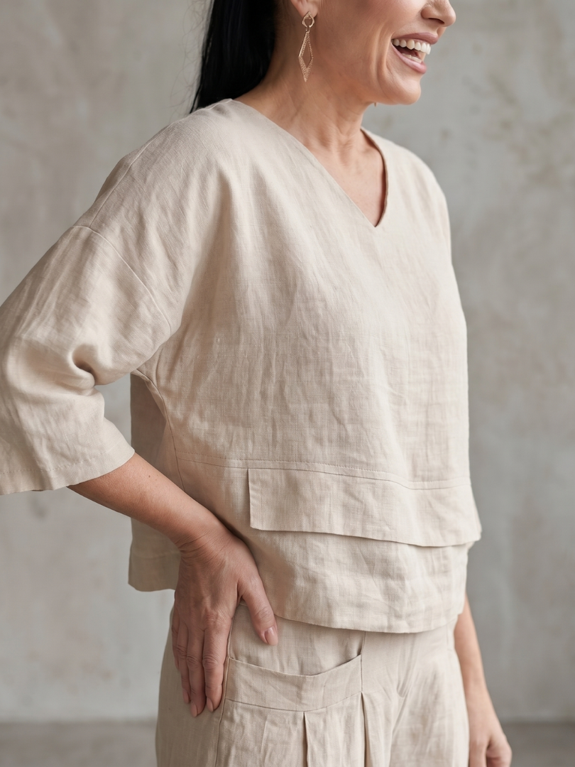 Completo da donna a strati con pantaloni a gamba larga