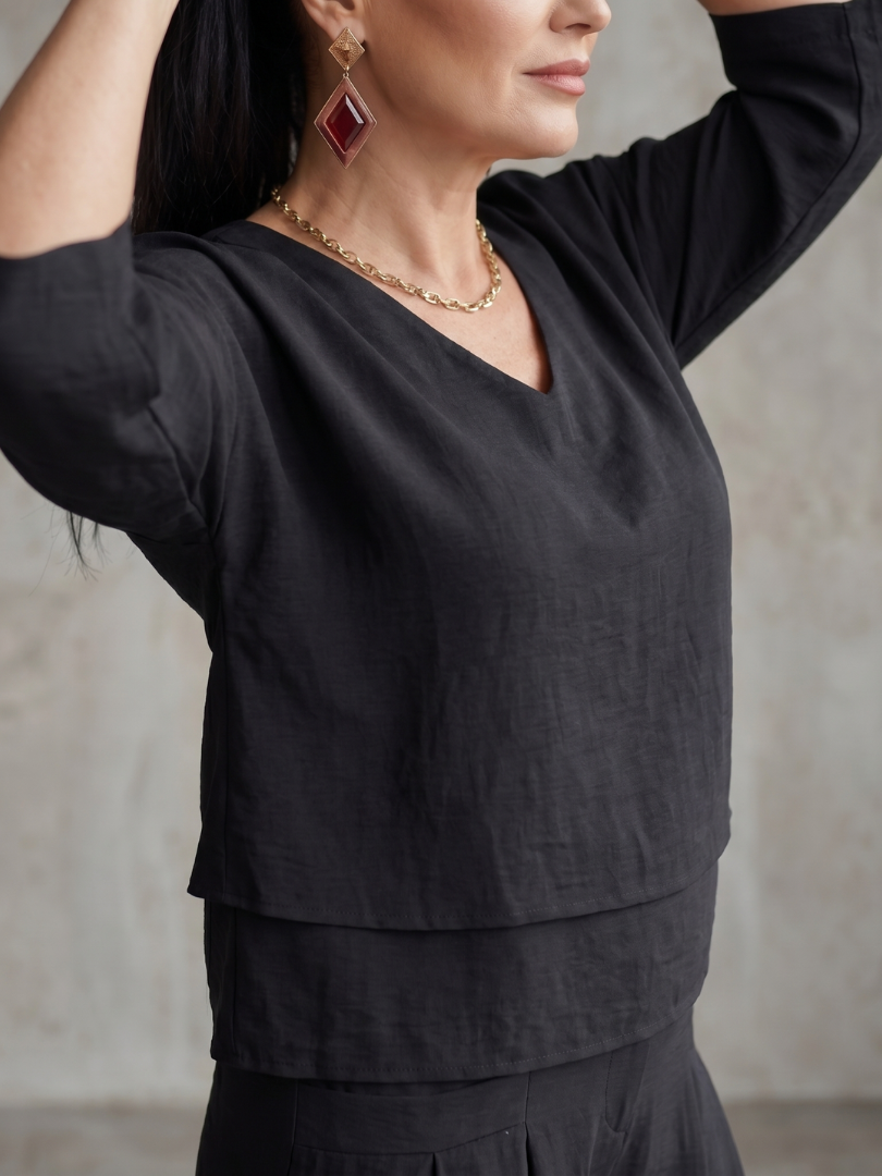 Completo da donna a strati con pantaloni a gamba larga