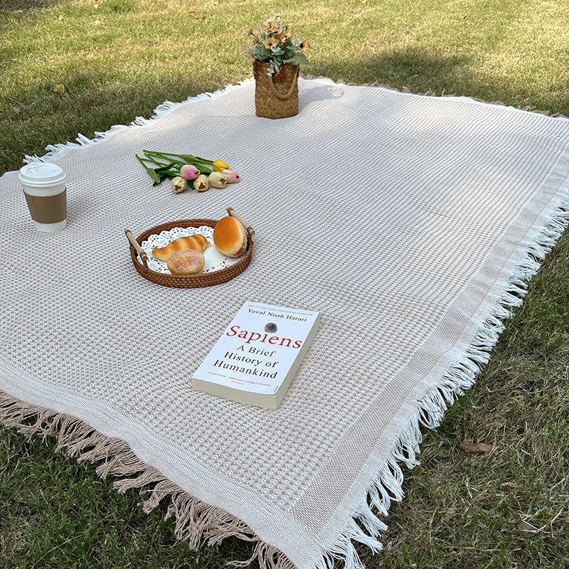 Coperta a quadri versatile e resistente per interno ed esterno