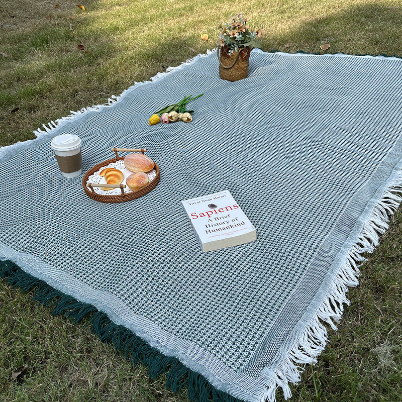 Coperta a quadri versatile e resistente per interno ed esterno