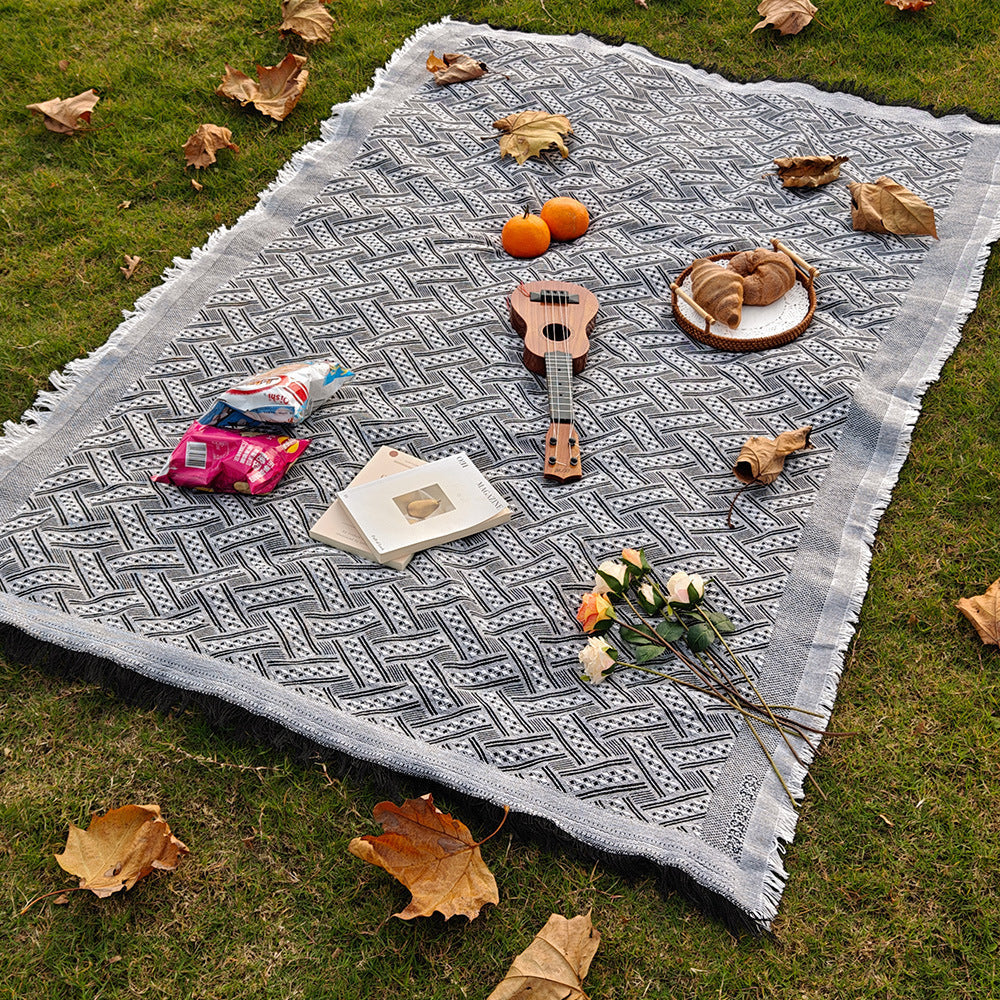 Coperta a quadri versatile e resistente per interno ed esterno