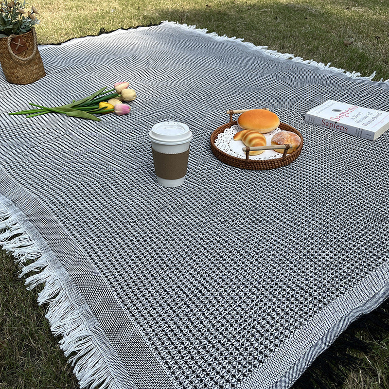 Coperta a quadri versatile e resistente per interno ed esterno