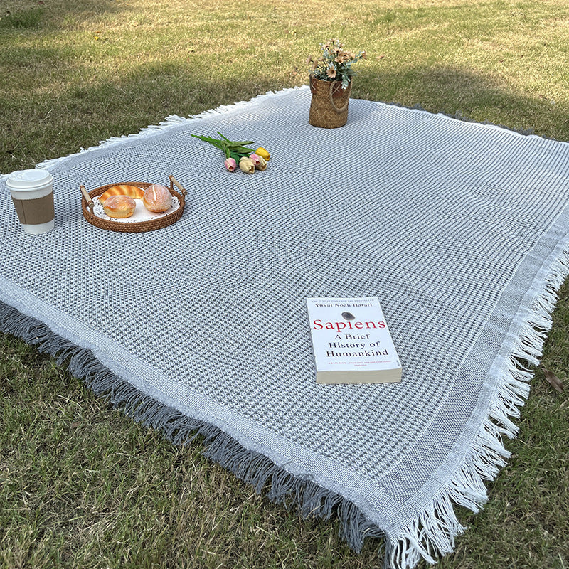 Coperta a quadri versatile e resistente per interno ed esterno