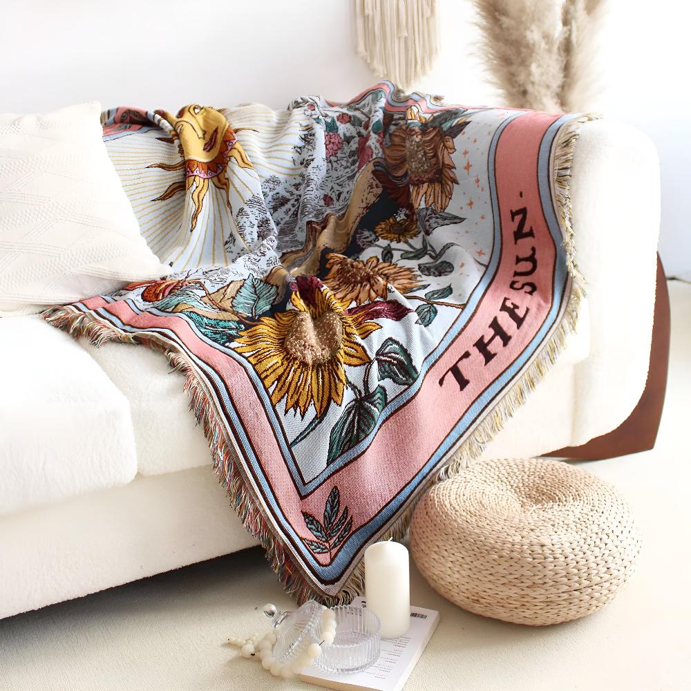 Coperta arazzo in stile boho con motivo a sole