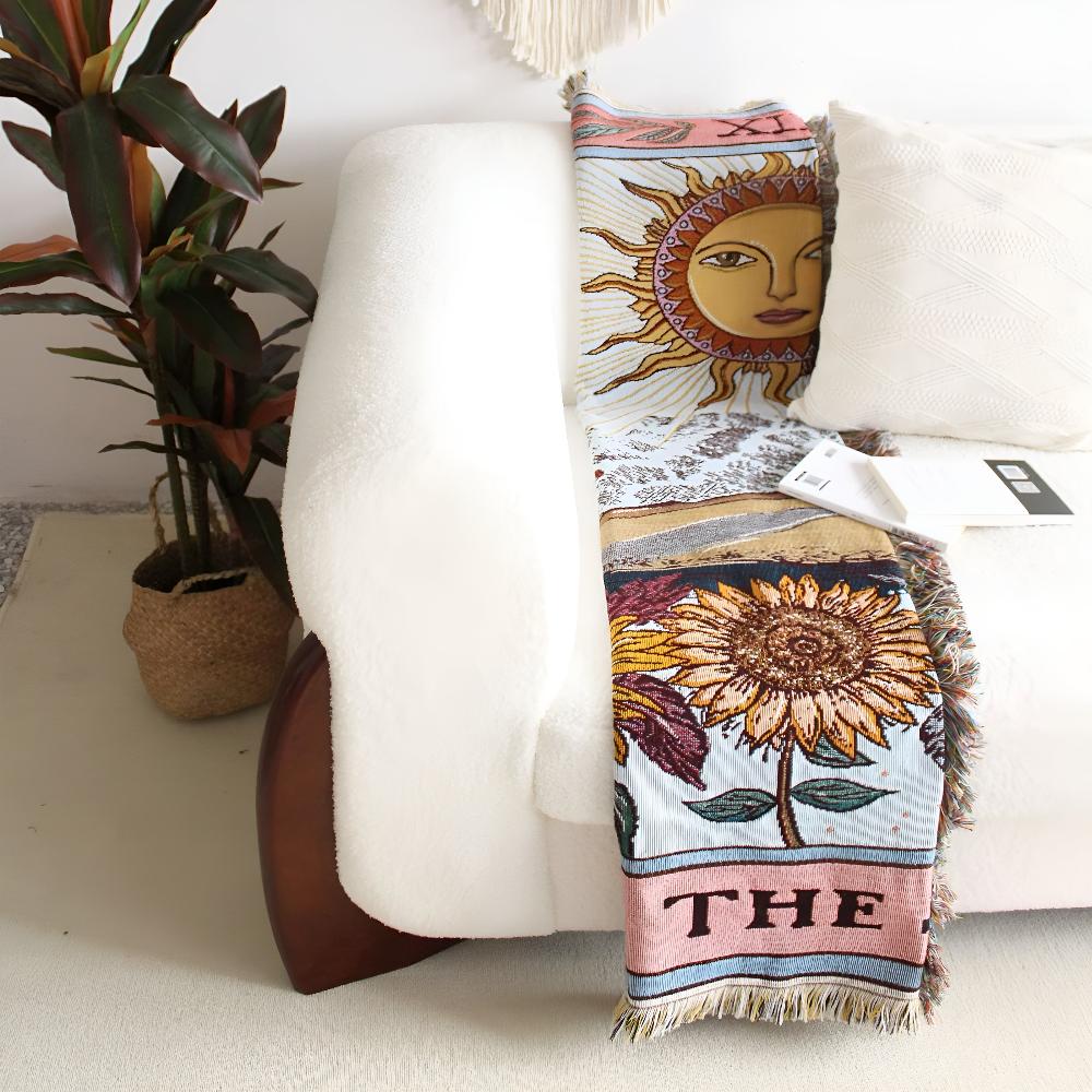 Coperta arazzo in stile boho con motivo a sole