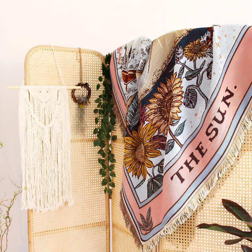 Coperta arazzo in stile boho con motivo a sole