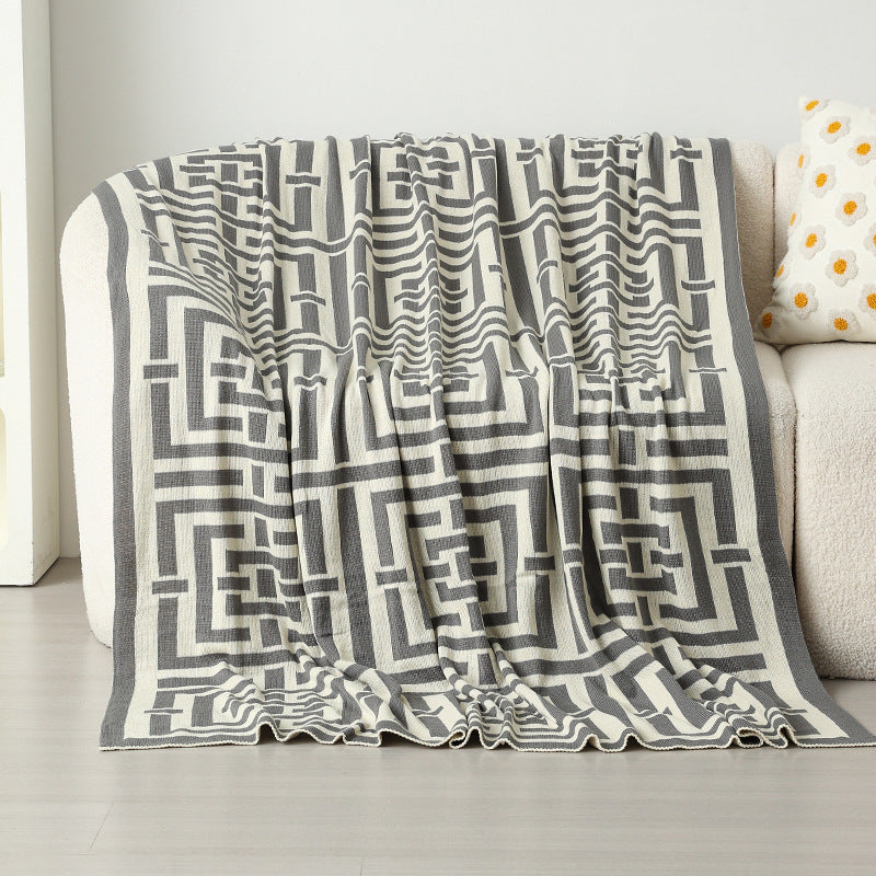 Coperta decorativa calda da donna con moderno motivo geometrico
