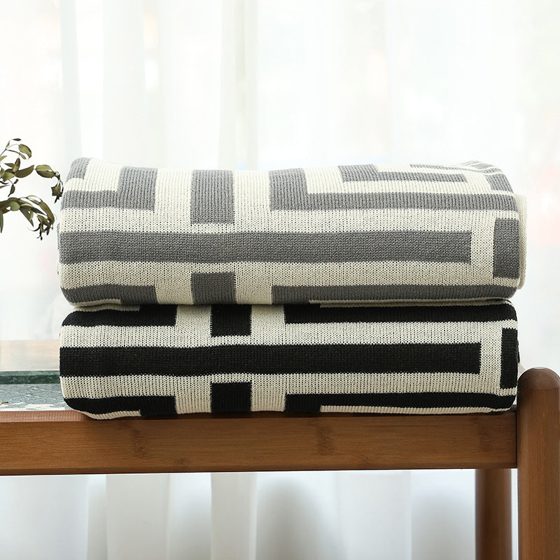 Coperta decorativa calda da donna con moderno motivo geometrico