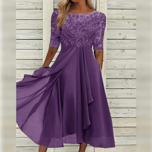 Elegante abito midi da cerimonia con dettagli in pizzo e gonna fluida