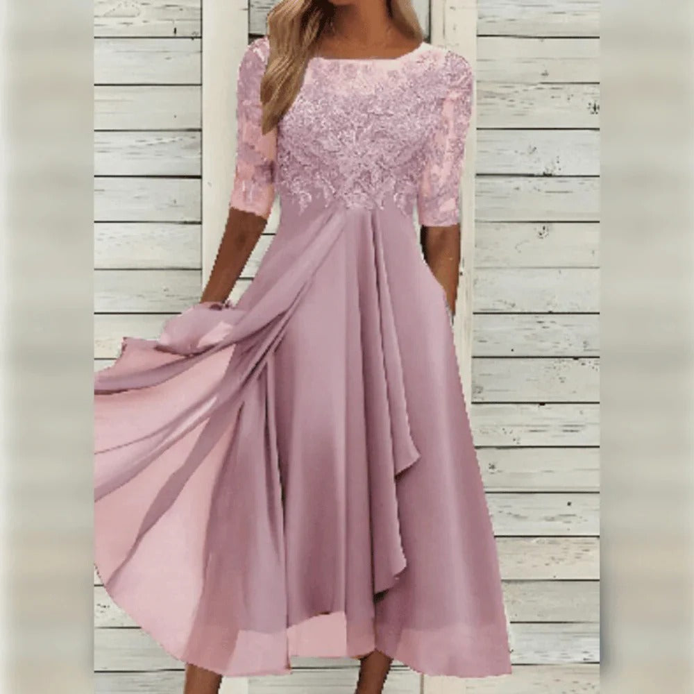 Elegante abito midi da cerimonia con dettagli in pizzo e gonna fluida