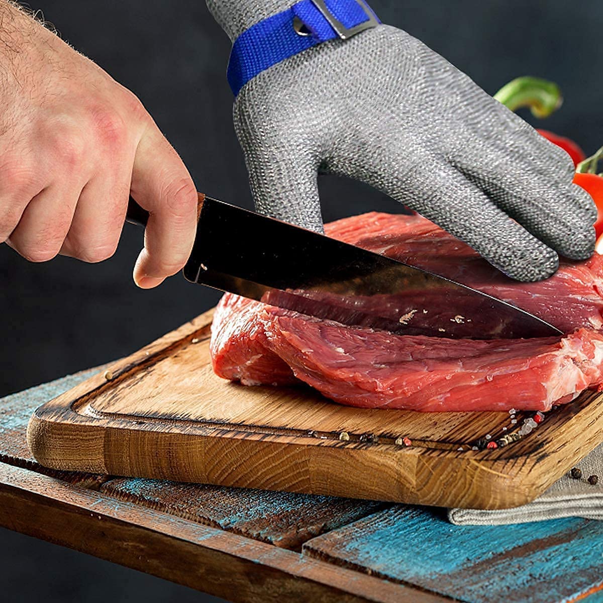 Guanto in maglia d'acciaio inossidabile antitaglio per uso alimentare