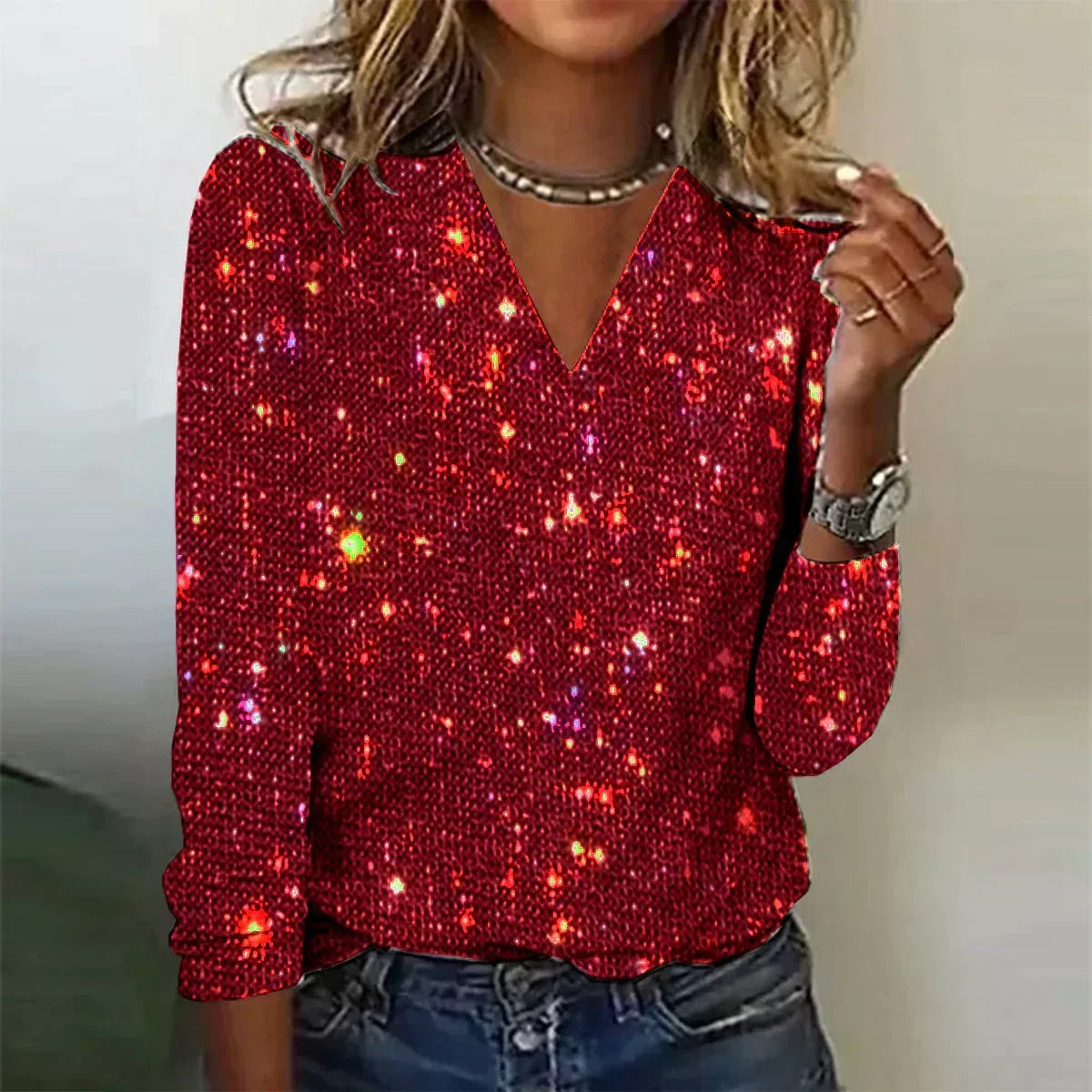 Maglione lucido con scollo a V e paillettes