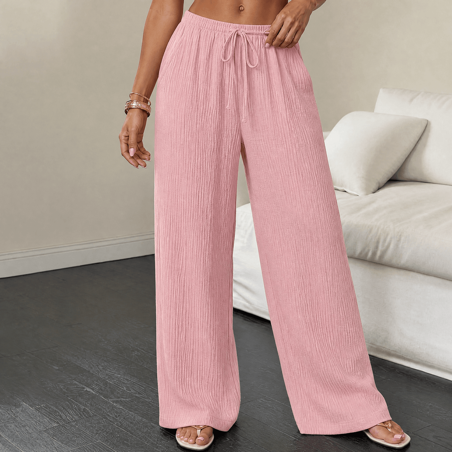 Pantaloni a gamba larga in tessuto goffrato