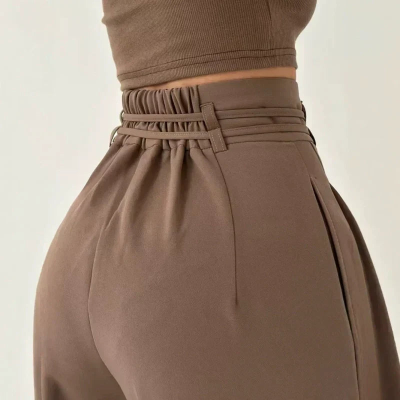 Pantaloni da donna a vita alta con pieghe e gamba larga
