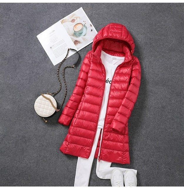 Piumino lungo da donna con cappuccio rimovibile