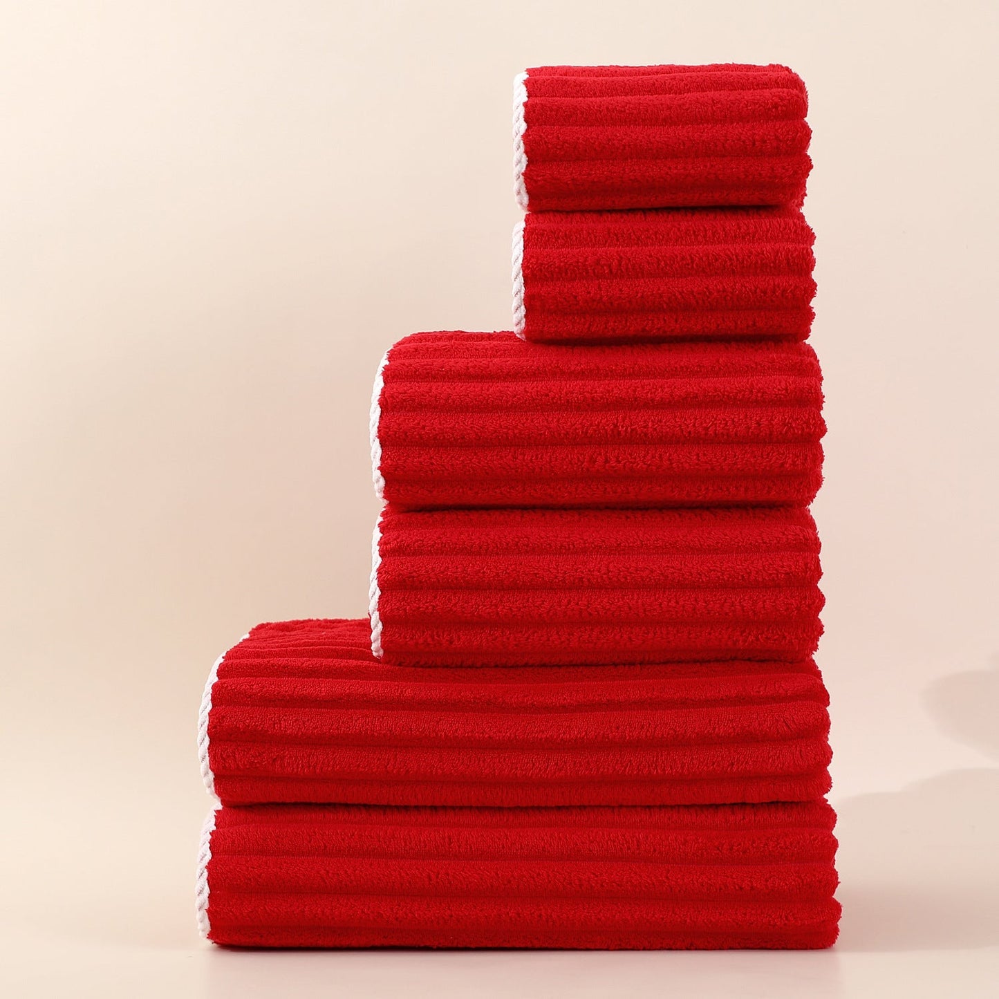 Set di asciugamani viso a righe assorbenti in coral fleece