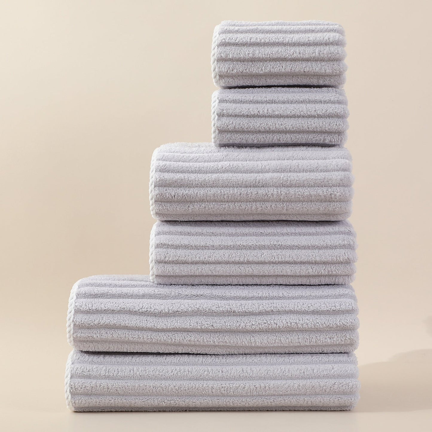 Set di asciugamani viso a righe assorbenti in coral fleece