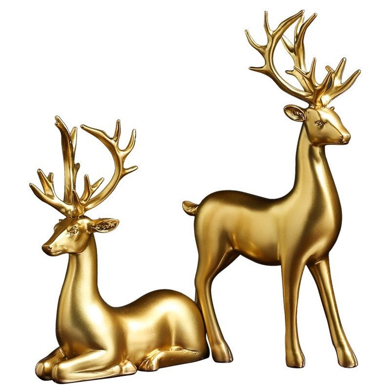 Statuette di coppia di cervi dorate