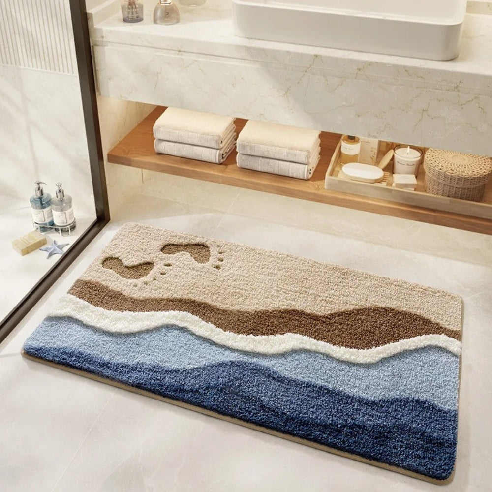 Tappetino da bagno con motivo a impronte e tema marino