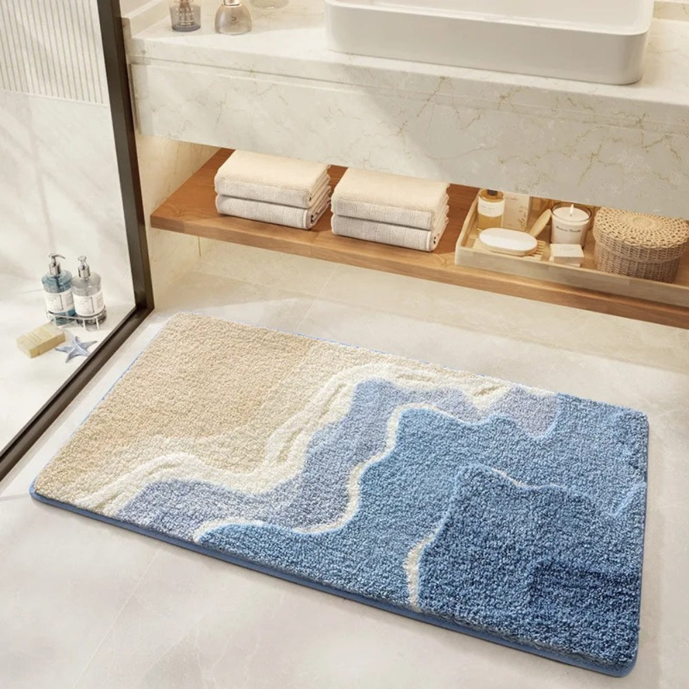 Tappetino da bagno con motivo a impronte e tema marino