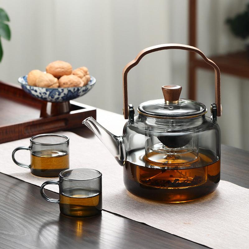 Teiera in vetro da 1,2 l con coperchio in legno e filtro – Vetro fumé e legno per un elegante servizio del tè