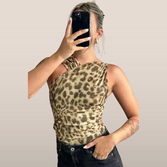 Top asimmetrico con motivo animalier
